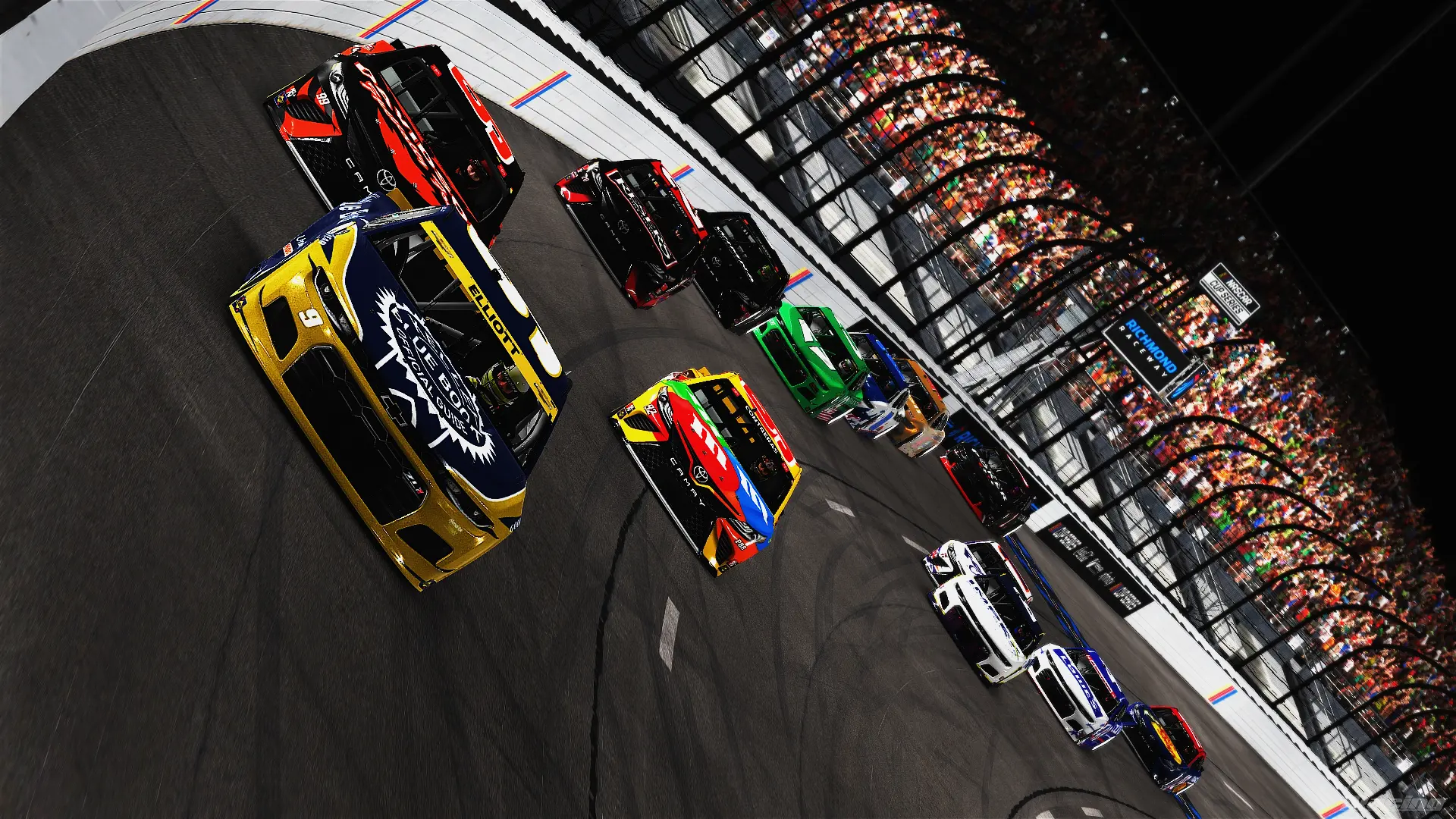 AARC field racing three-wide under the lights at Richmond Raceway